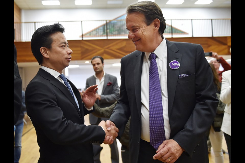 Ken Sim won 977 out of 1,960 votes cast Sunday at the Hellenic community centre to win the NPA's leadership race. John Coupar was the first to congratulate him. Photo Dan Toulgoet