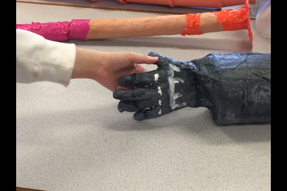 Guildford Park Secondary students work on their hybrid humans for their upcoming exhibition at New Media Gallery.
