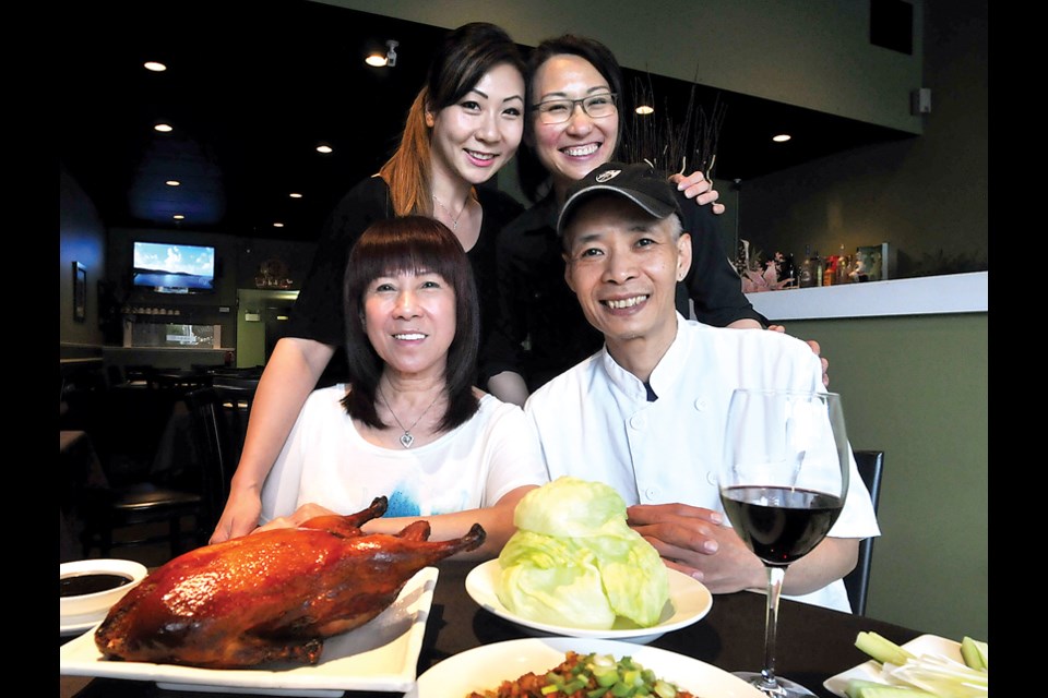 Ginger and Soy Traditional Chinese Cuisine is a family affair with sisters Julia Lam (left) and Suzannah Yeung working with parents Sandy and Ben as they creates dishes such as Peking Duck and elaborate desserts created by Suzannah.