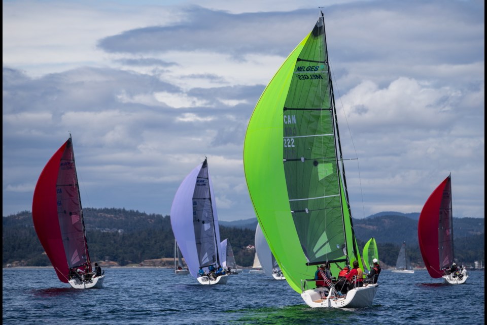Although the yachts all had identical specifications, the sails provided a riot of colour out on open water.