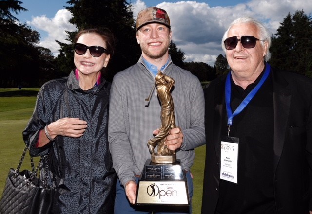 Sam Fidone with the championship trophy presented by Ken Mariash and his wife Patricia, the major sponsor of the Bayview Place DC Bank Open presented by the Times Colonist