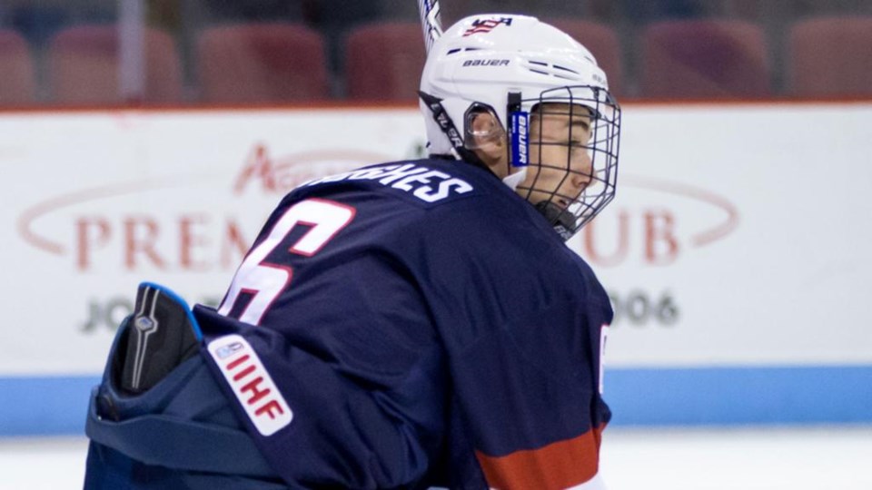 Quinn Hughes skates for Team USA.