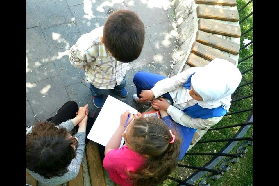 Children hard at work for a storytelling event.