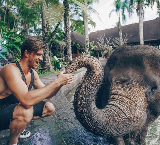 Richmond native Ryker Gamble plays with a rescued elephant in Bali