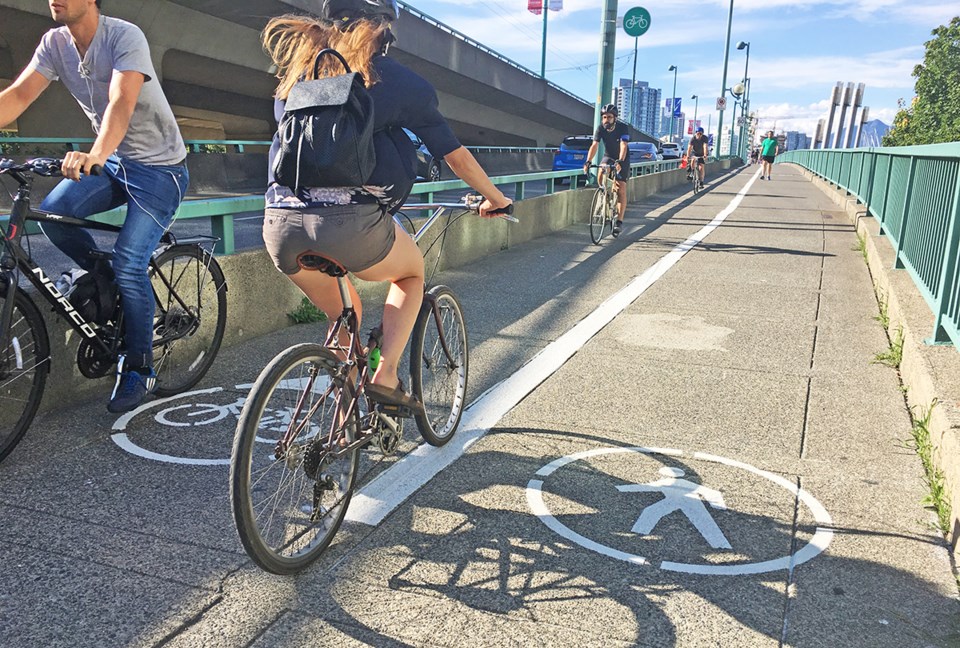 Cambie Bridge cyclists