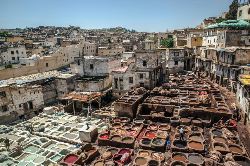 Tanneries in Fez, Morocco soak hides in stone vessels filled with dyes.