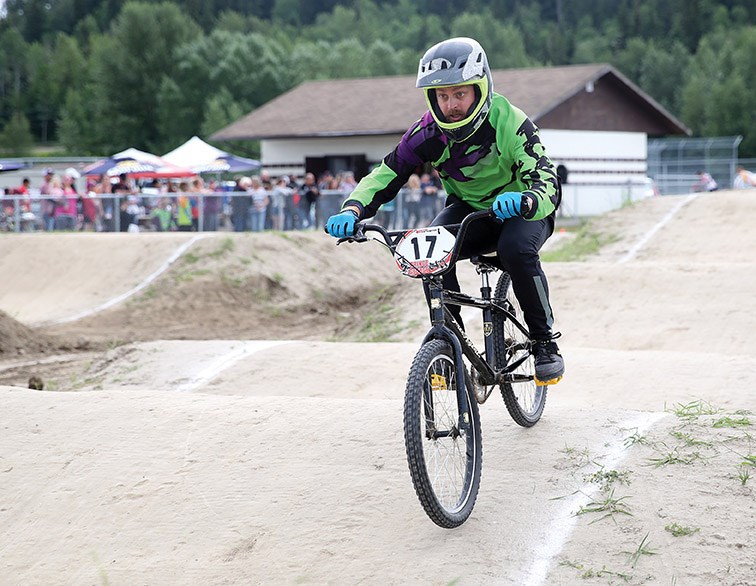 Travis Carlson eyes up the final corner at Supertrak BMX on Sunday during the weekend provincial races held at the Carrie Jane Gray Park facility. – Citizen photo by James Doyle