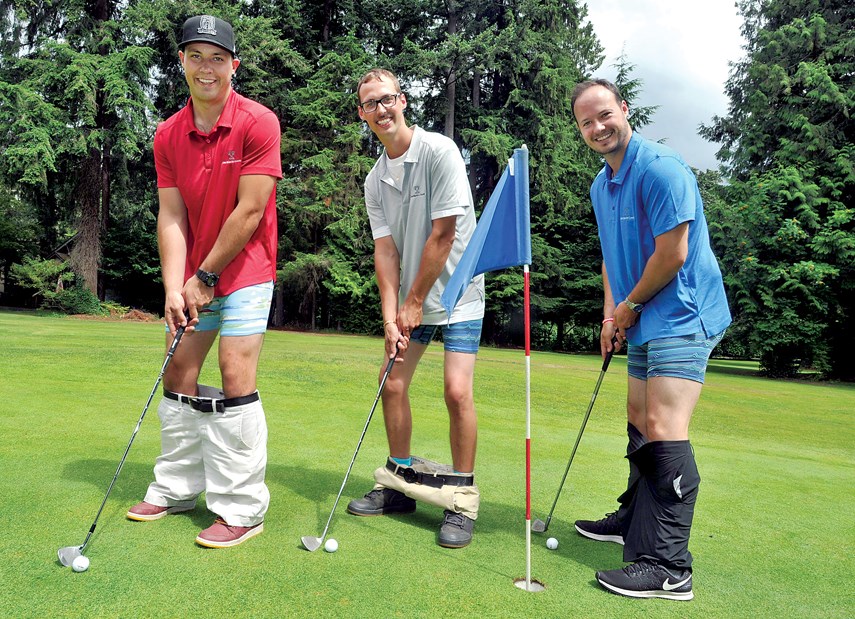 Connor, Luke and Nick Martin practise for the Pants Down Tee-Off during the Jim Martin Classic held at Murdo Frazer Golf Course Saturday. photo Paul McGrath, North Shore News