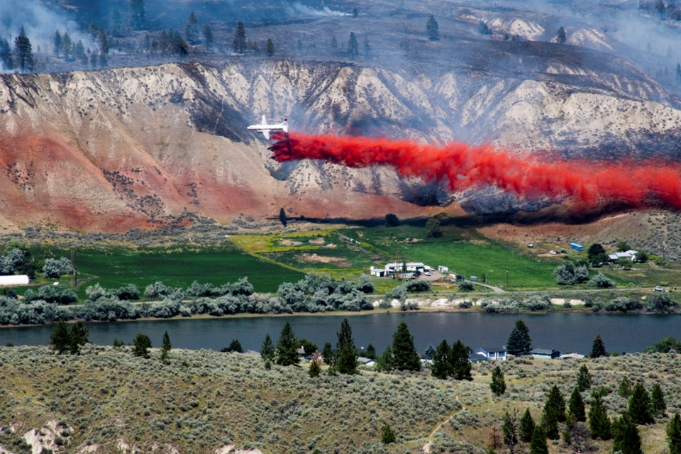 Shawn Thompson, professor of journalism at Thompson Rivers University, sent KTW this photo of a plane dropping fire retardant next to the Shuswap Road fire on Thursday, July 12: