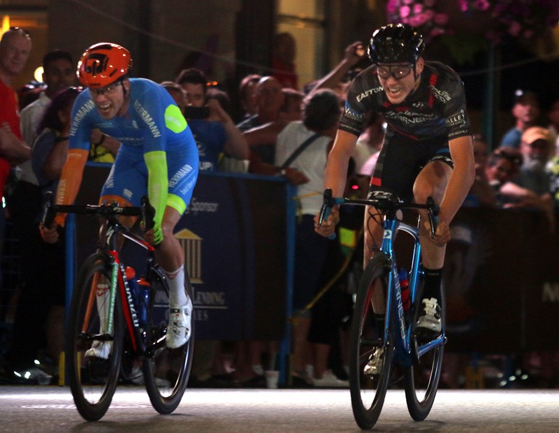 Mitch Kettler, right, pips Florenz Knauer on the finish line to win the men's professional race at Friday's PoCo Grand Prix. The third annual race was the first in BC Superweek history to be held under the streetlights.