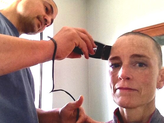 Mary's head being shaved in anticipation of the harsh effects of chemotherapy