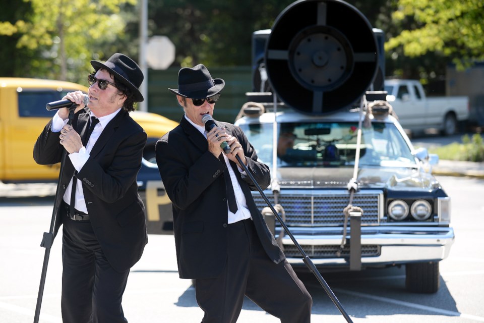 The Blues Brothers perform at the Royal City Show and Shine.
