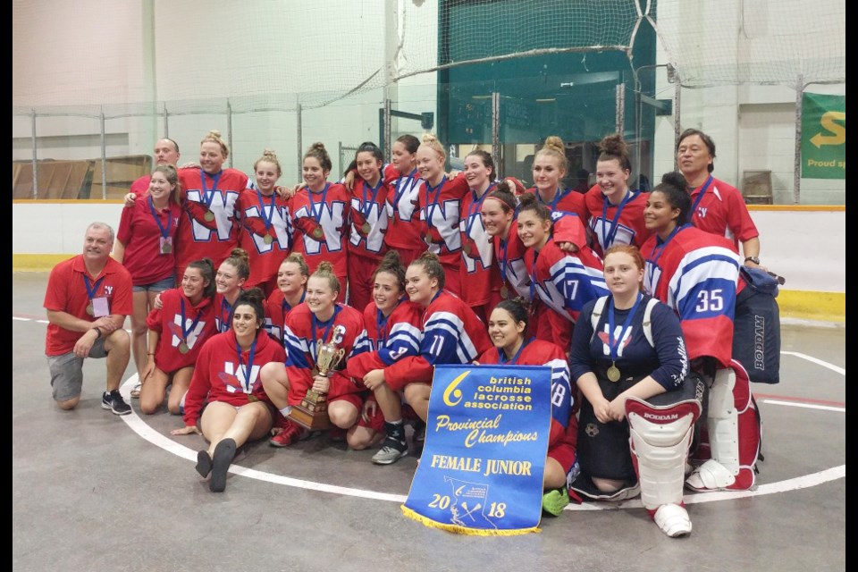 The B.C. junior girls champions celebrate their dramatic overtime win over Port Coquitlam.