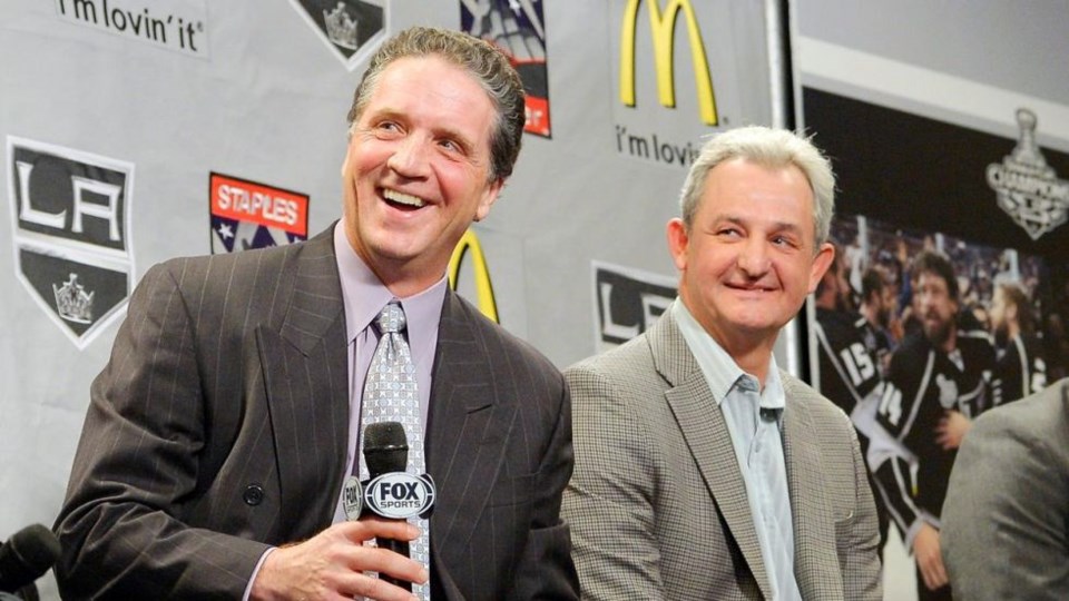 Dean Lombardi and Darryl Sutter, then of the Los Angeles Kings, answer media questions.