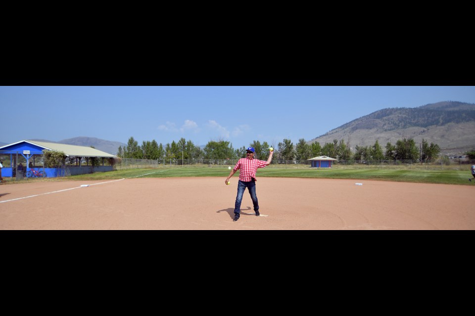 Tk'emlups Chief Fred Seymour throws out the opening pitch at the refurbished Tyee Ball Park.