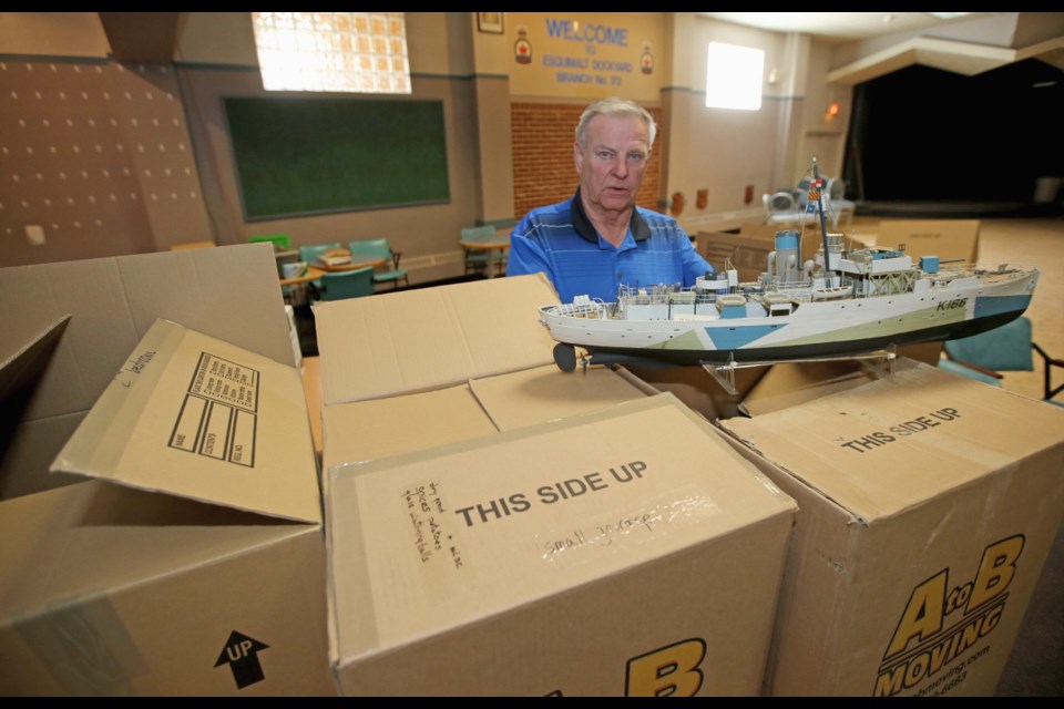 Doug Grant, manager of Esquimalt Dockyard branch of Royal Canadian Legion, amid moving boxes. July 30, 2018