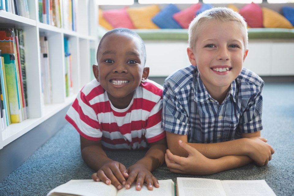 Kids reading, iStock