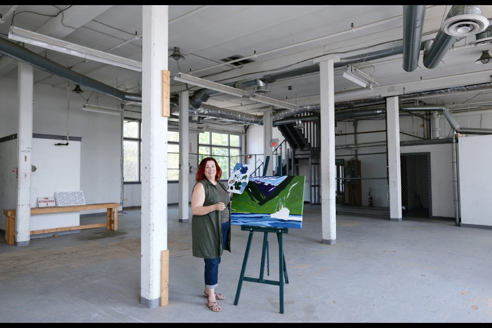 Susan Greig, owner of 100 Braid Street Studios, in the new space the studio is expanding into.