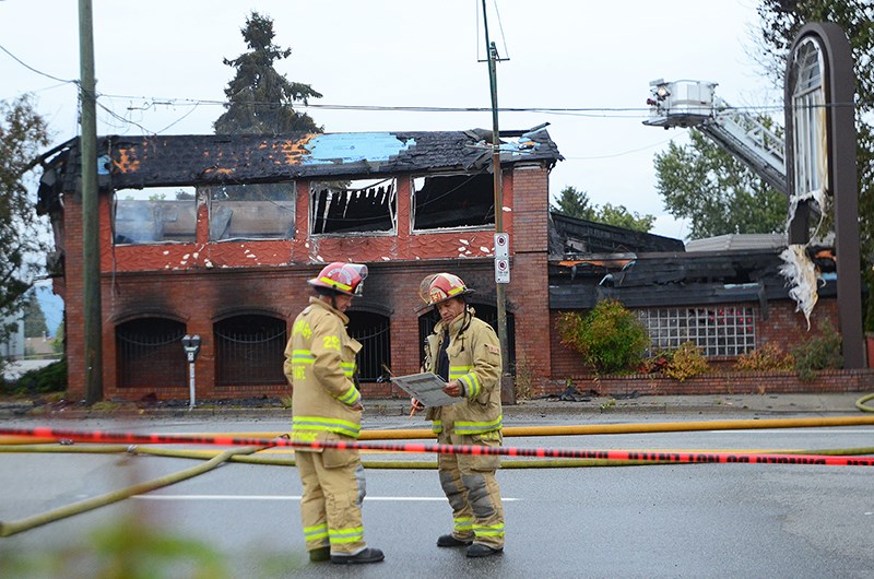 A vacant building that long housed the offices of the Beedie Development Group and then the B.C. NDP was gutted by fire early Friday morning.