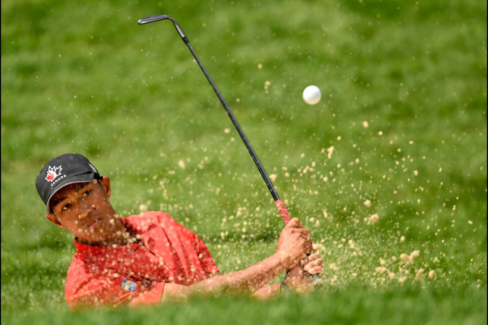 Following his outstanding week on the PGA Tour, Chris Crisologo tees off closer to home this coming week at the Canadian Men's Amateur in Duncan. Here, the Richmond native blasts his way out of the bunker during second round play at the Canadian Open at Glen Abby.