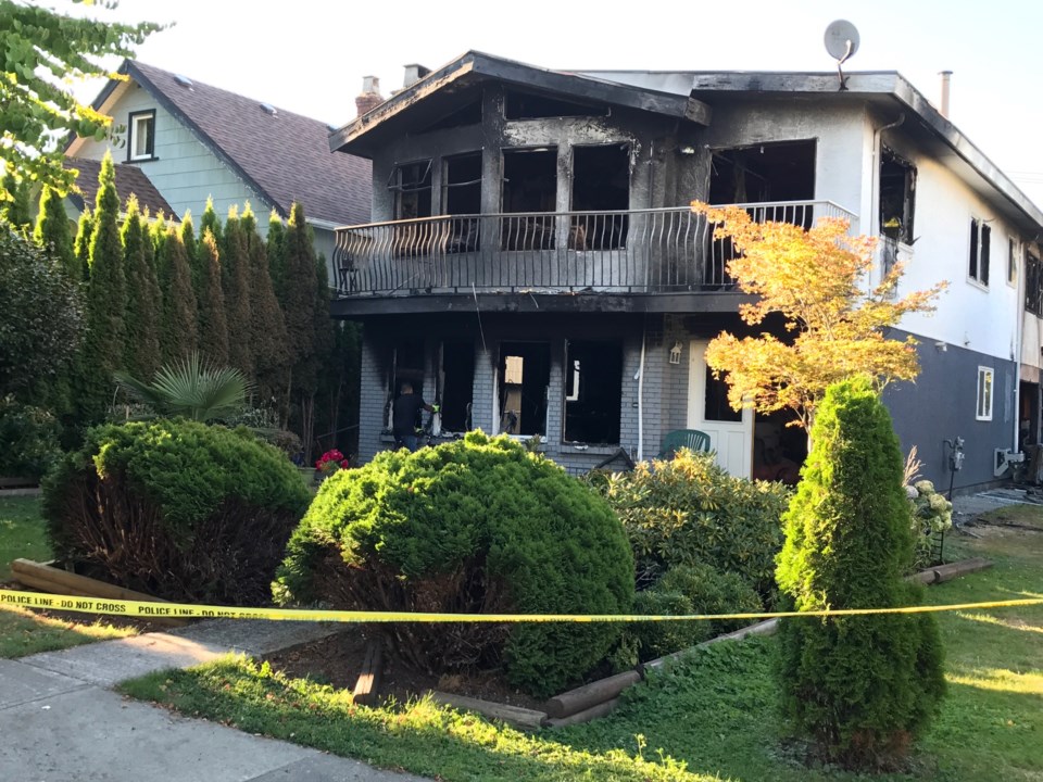 A fire gutted an East Vancouver home Aug. 7. One person died. Photo Naoibh O'Connor