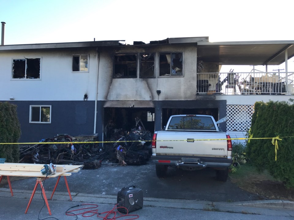 A fire gutted an East Vancouver home Aug. 7. One person died. Photo Naoibh O'Connor