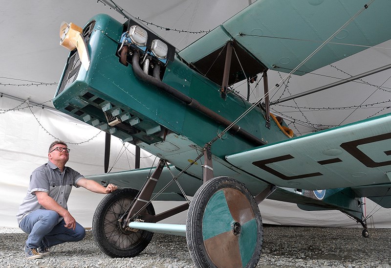 MARIO BARTEL/THE TRI-CITY NEWS
Markus Fahrner, a coordinator at Port Moody's Station Museum, checks out a 7/8-scale replica of a S.E.5a WWI biplane that will soon be displayed adjacent to the McKnight trench.