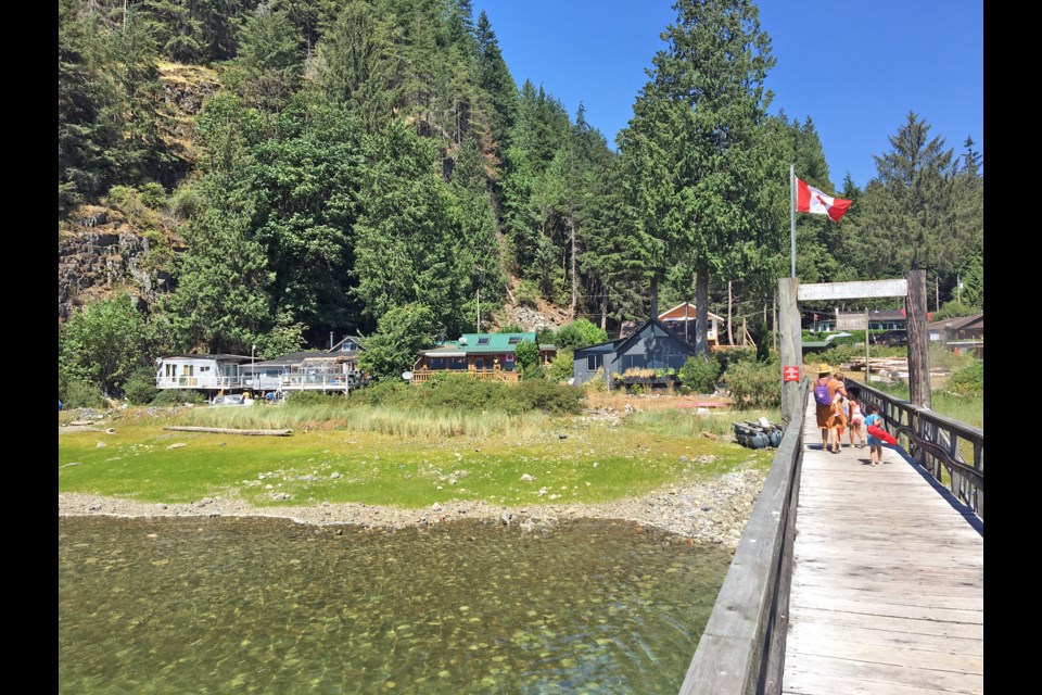 Just a 10-minute boat ride from Deep Cove, the private 22-lot development of Brighton Beach has been charming residents and invited guests since the 1940s. Photo Grant Lawrence