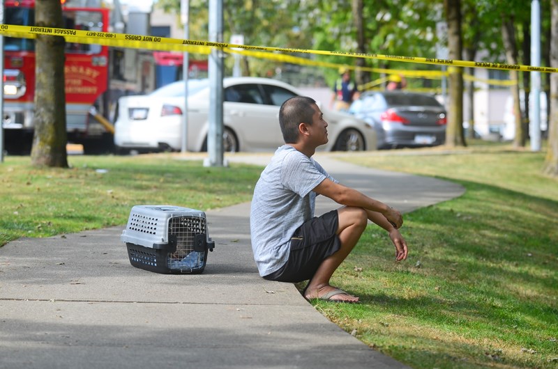 Jeff Shih and his cat Carl – residents of a Metrotown apartment – were forced onto the street Wednesday due to a fire in a fifth-floor apartment.