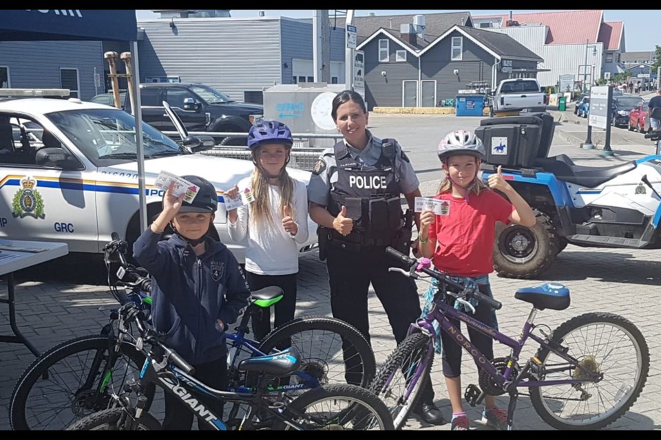 Richmond RCMP issues "positive ticket" to youths who are “caught” behaving conscientiously. Photo submitted