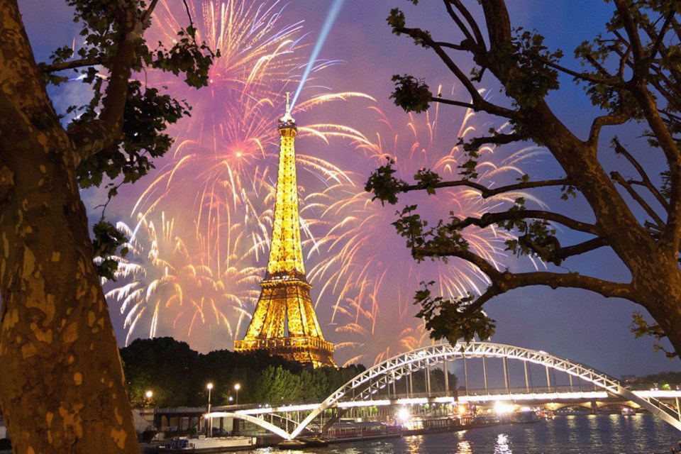Paris's Bastille Day celebration culminates with a fireworks show at the Eiffel Tower, where France's national anthem rings through the Champ de Mars.