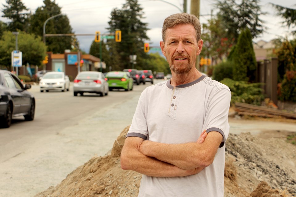 Burnaby resident Doug Brown says the uneven surface makes walking along Rumble Street difficult, and maybe even dangerous.