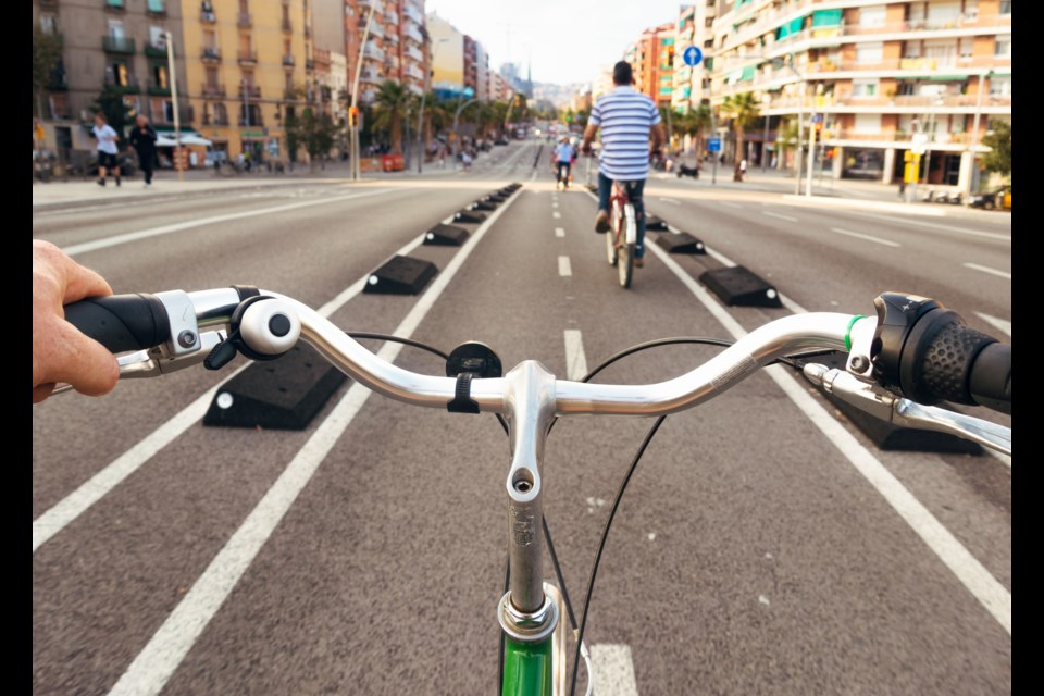 According to columnist Michael Geller, 鶹ýӳwould be wise to adopt raised bike lane markers found in many Spanish cities. Photo iStock