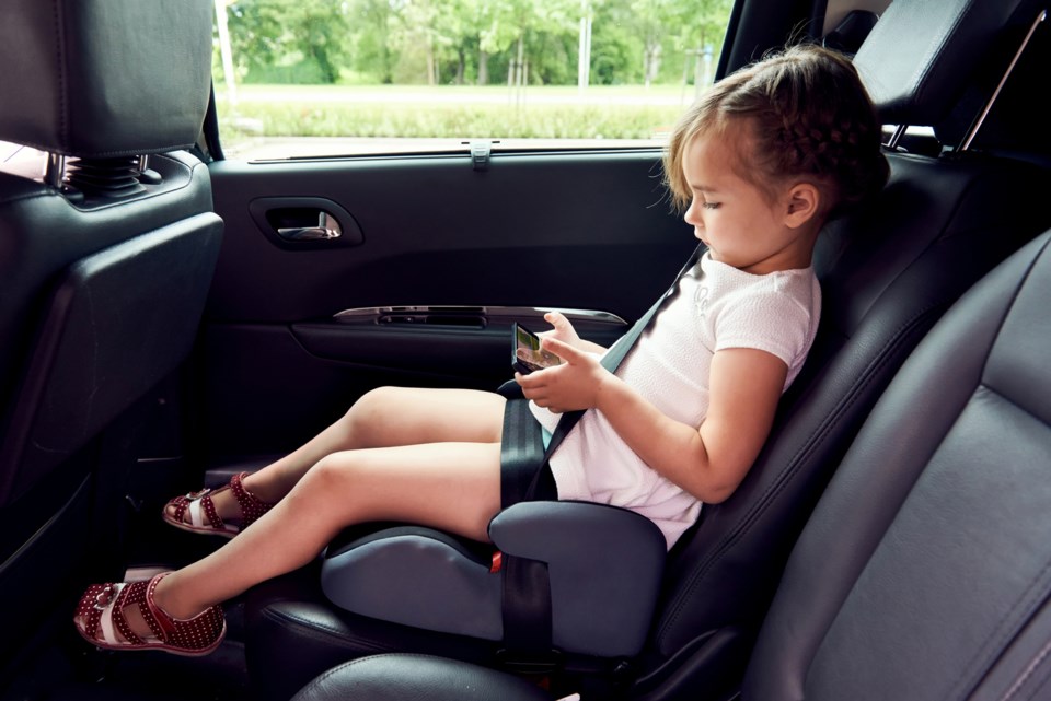 child in car