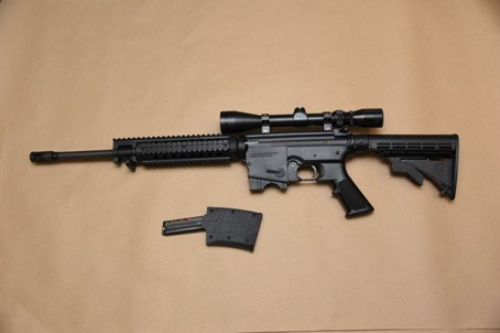 A Bushmaster 5.56 semi automatic seized during the investigation.