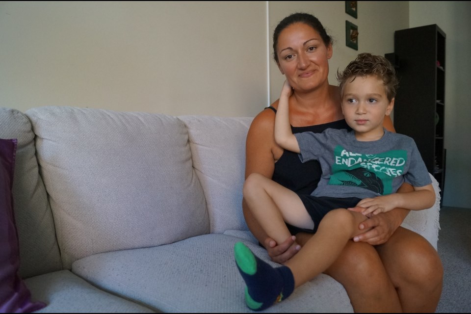 Richmond mom Federica Carcani is warning people not to discard BBQ coals on the beach after son Bruce, 3, suffered second-degree burns at Centennial Beach July 22. Graeme Wood photo.
