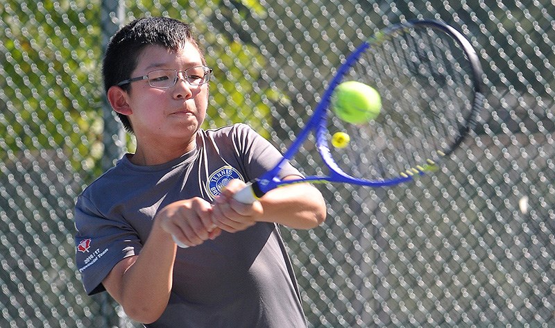 Owen Nguyen, 11, fires a backhand volley as he hones his game at the Coquitlam Tennis Club in preparation for the U12 national championships in Mont. Tremblant, Que., Aug 21 to 27.