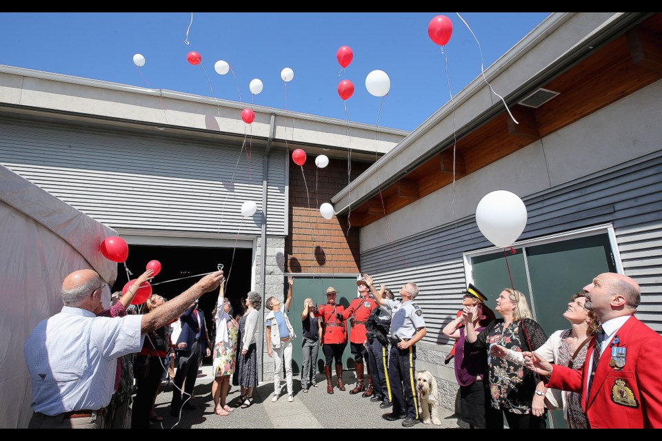 VICTORIA, B.C.: August, 16, 2018 - A memorial in Sidney Thursday will honour the life of Krista Carle, the former Nanaimo Mountie who became an advocate for RCMP officers who faced sexual harassment.Carle, 53, died by suicide on July 6, after a long struggle with post traumatic stress disorder. The guests, friends and family let 27 balloons into the air at the Mary Winspear Centre. VICTORIA, B.C. August 16, 2018. (ADRIAN LAM, TIMES COLONIST). For City story by Katie DeRosa.