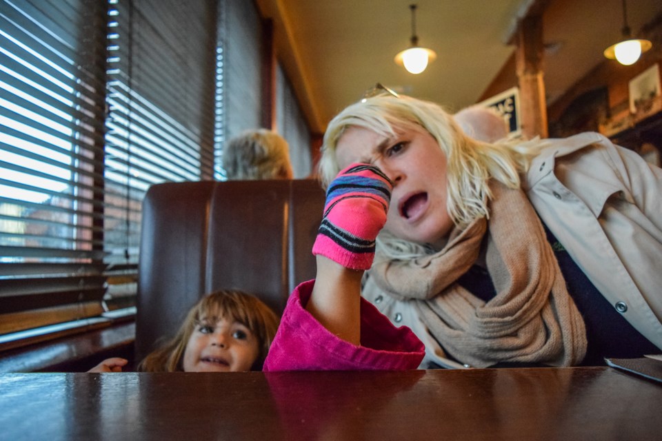 child at restaurant, iStock