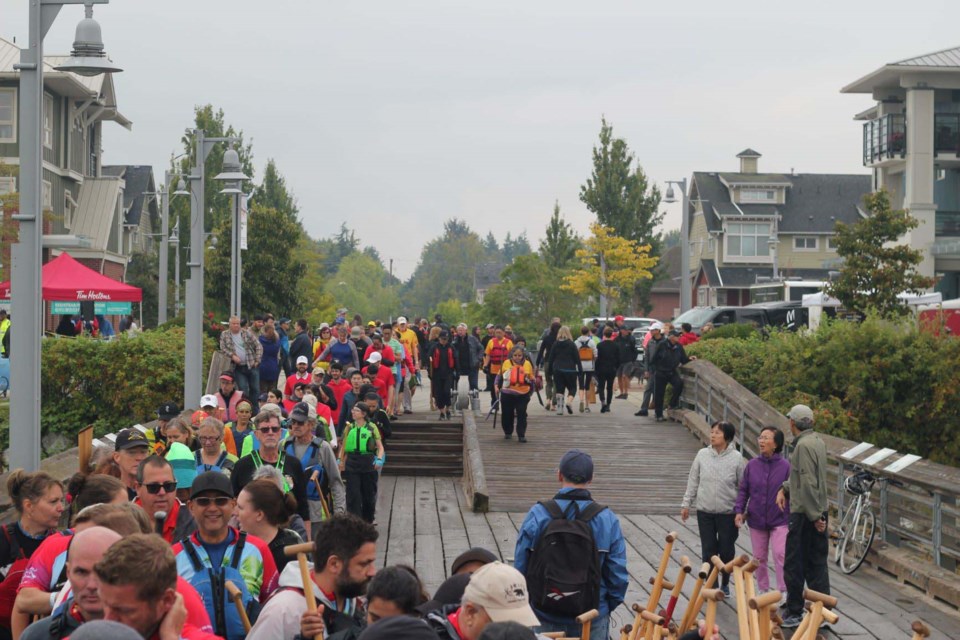 Paddlers prepare for their next race. Photo: Alyse Kotyk