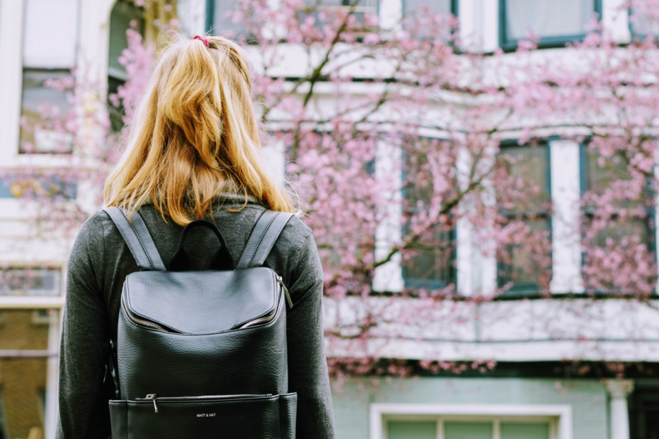 Unsplash, woman with backpack