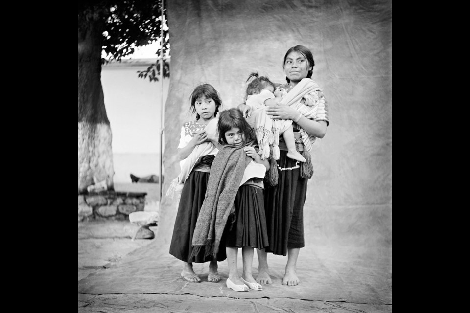 Mom and three children, Mitotonic, Chiapas, from The Mayan Dress Code: Legacy and Continuity in Chiapas, Mexico.
