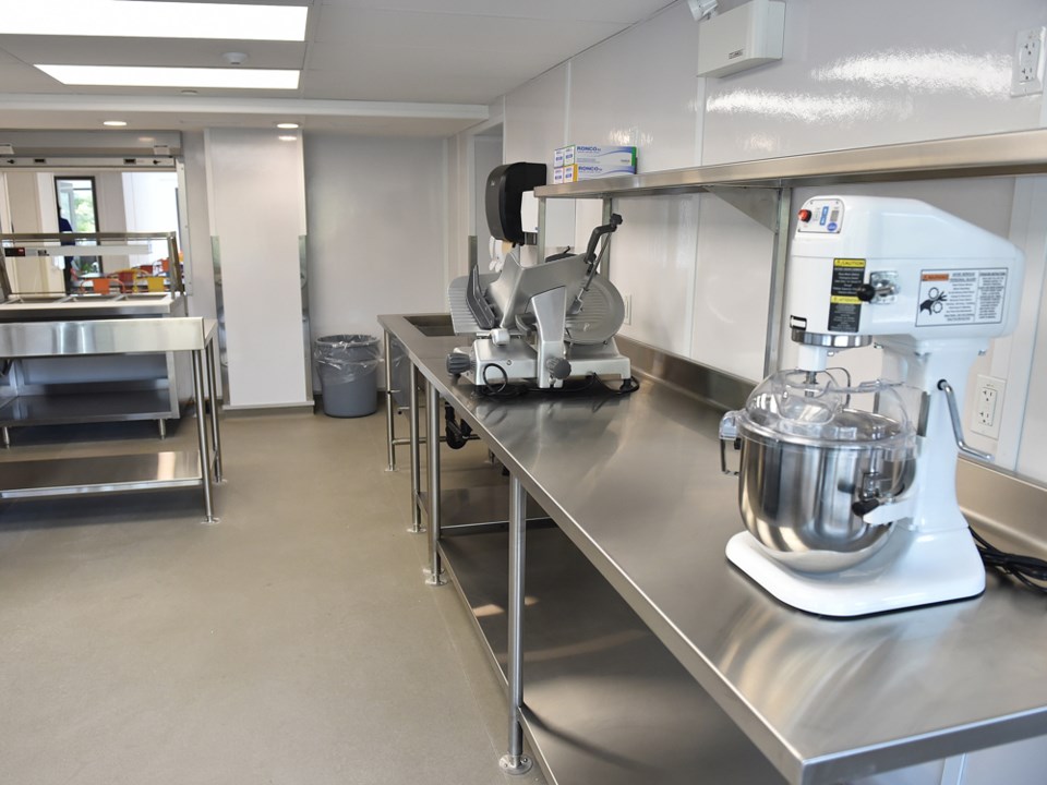 The M. Mitchell Place modular housing complex includes a commercial kitchen. Photo Dan Toulgoet