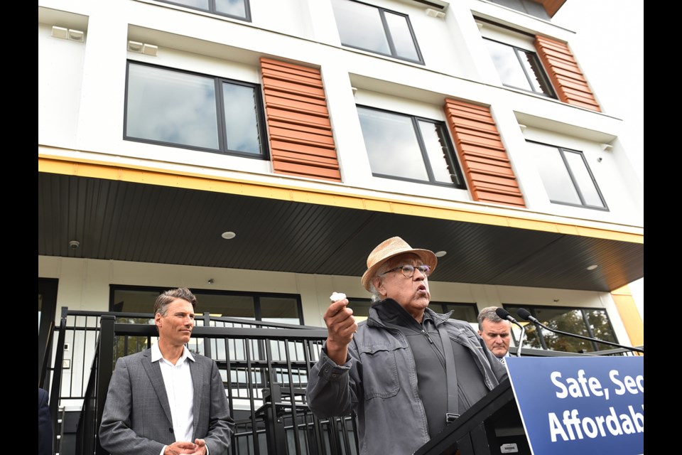 Musqueam elder Shane Pointe chanted in his language to welcome and bless the new modular housing complex opening at 2132 Ash St. Photo Dan Toulgoet