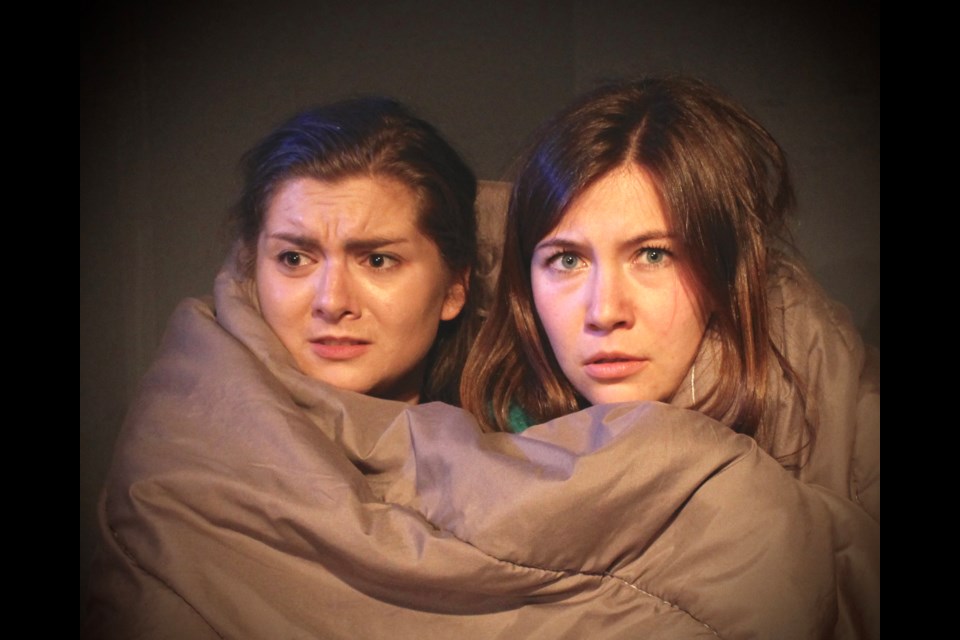 Elizabeth Drummond and Celeste Musseau in the Vagabond Players production of The Haunting of Hill House, onstage Oct. 4 to 27.