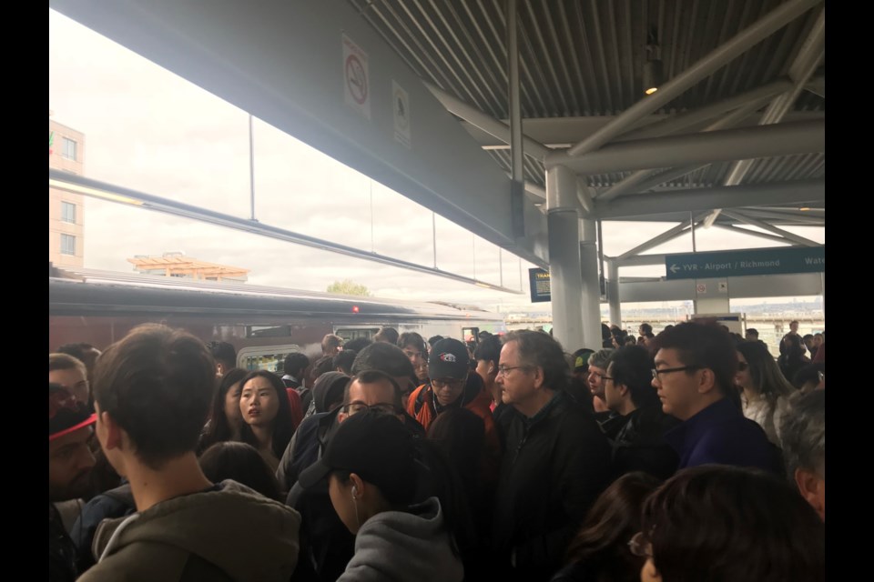 Crowds at Bridgeport Station, waiting to change trains. Photo: Alyse Kotyk