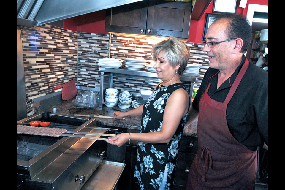 Foroz and Ali Manzoori at their Alibaba Capilano Café serving up Persian specialties and donair.