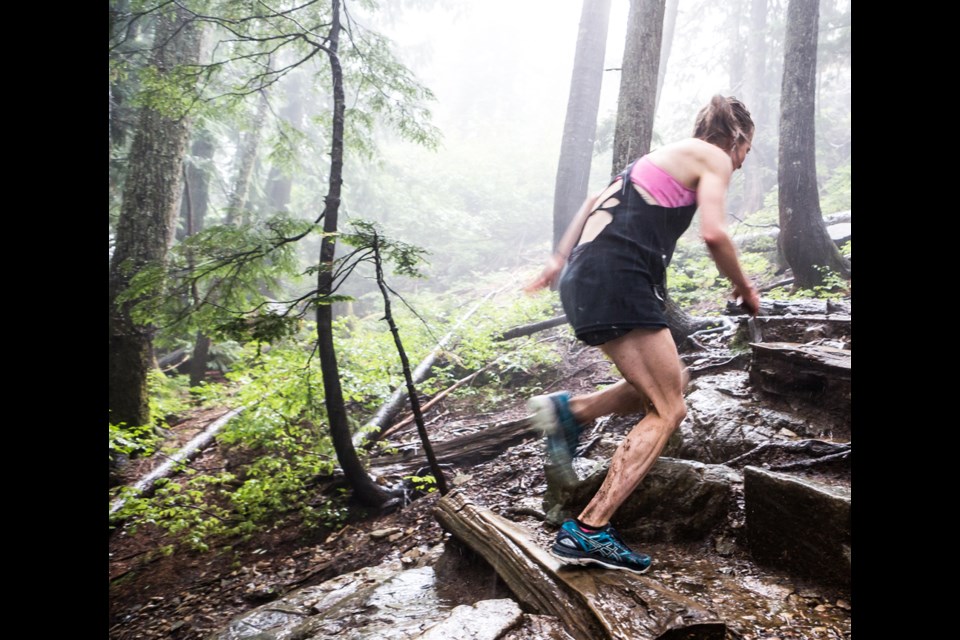 Madison Sands of Maple Ridge rips up the trail on her way to setting a new official record for the Grouse Grind Mountain Run. photo Grouse Mountain