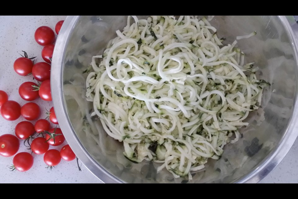 Spiralized zucchini, steamed or saut&eacute;ed in butter or oil, can serve as a vegetable bed for a tomato sauce.