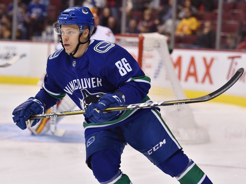 Petrus Palmu skates for the Vancouver Canucks in preseason action against the Calgary Flames.